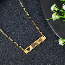 Engraved picture necklace