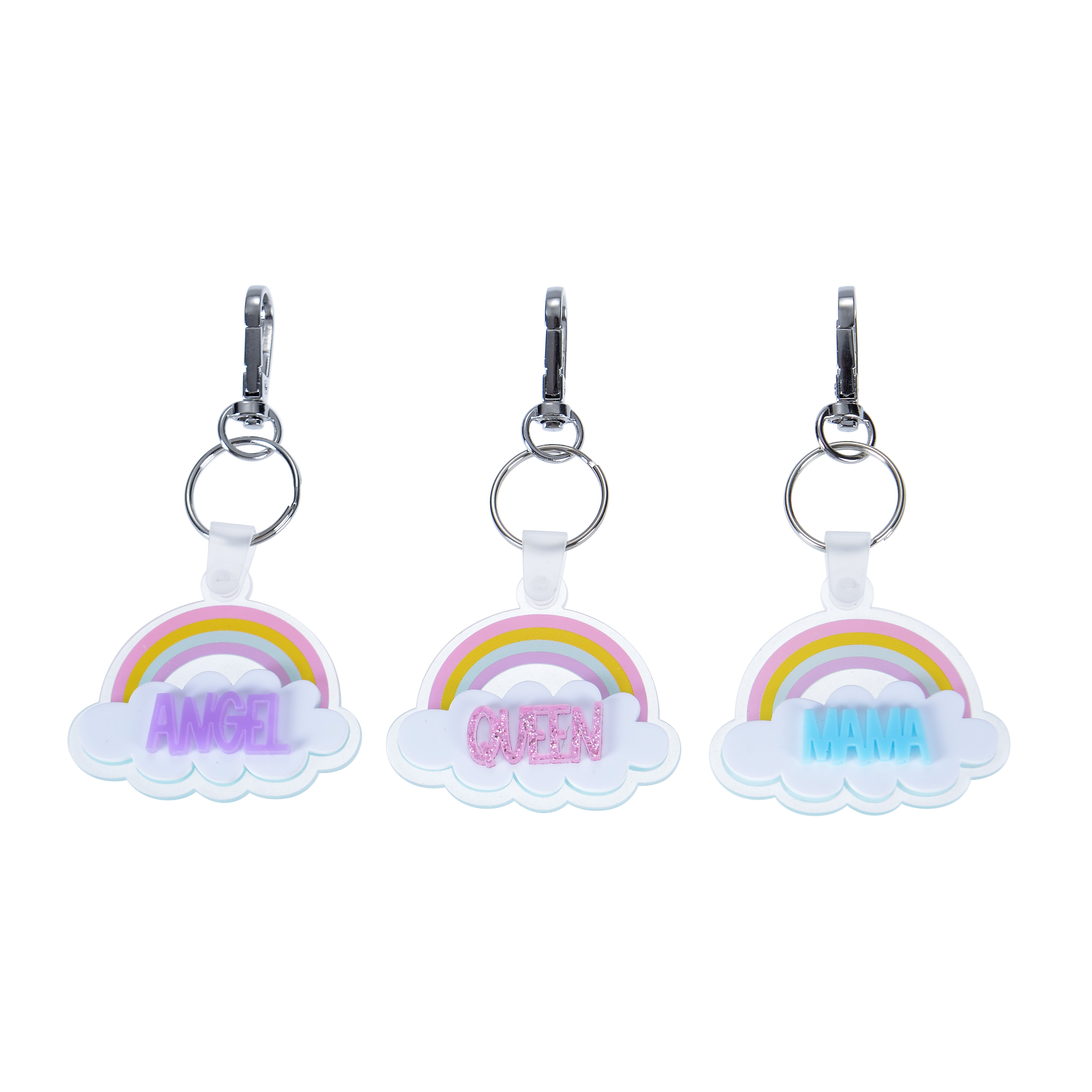 Trio of personalized pastel rainbow acrylic cloud keychains with purple, pink, and blue glitter names on white background.