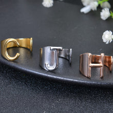Open band adjustable detail on personalized initial ring