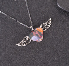 Back of personalized memorial angel wings necklace showing optional remembrance engraving.