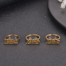 Gold custom year ring styled as a personalized birthday gift for her.