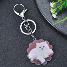 Personalized picture keychain showing a cherished family photo inside a flower-shaped design.