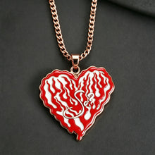 Close-up of personalized photo pendant necklace showing detailed custom picture engraving