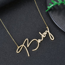 Gold personalized cursive name necklace with cubic zirconia