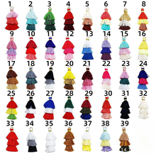A collection of 39 multi-colored tassel trims, each with three layers