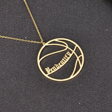 Gold personalized basketball name necklace featuring custom lettering inside a basketball pendant.