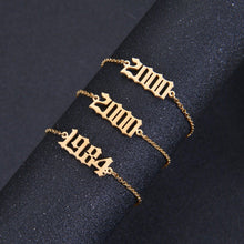 Personalized birth year anklet displayed as a meaningful custom jewelry gift for a birthday, anniversary, or milestone.