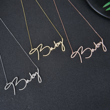 Chain and clasp detail on personalized cursive necklace