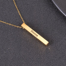 Gold personalized four sided bar necklace engraved with custom names and dates.