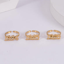 May include: Three gold rings with the years 1994, 1995, and 1996 engraved on them.