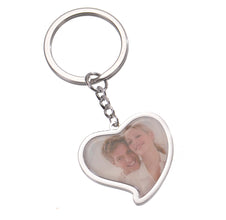 Silver personalized heart picture keychain with custom couple portrait printed on smooth metal charm.