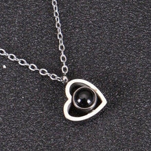 Silver heart photo projection necklace with custom photo center