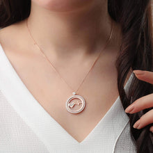 Woman wearing personalized heartbeat circle necklace