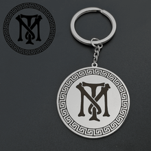 Silver custom logo keychain featuring a personalized business design on a round metal keyring