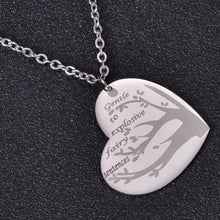 Silver personalized family name necklace with engraved loved ones' names on a heart pendant.