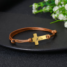 Brown cord personalized cross bracelet with engraved name
