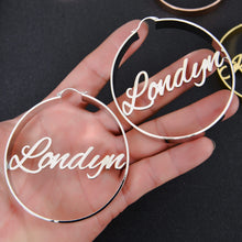 Close-up view of top latch closure mechanism on custom round script name hoop earrings.