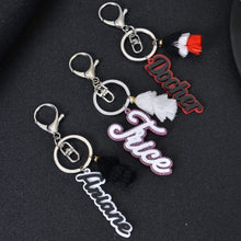 Custom name keychain displaying cursive script lettering