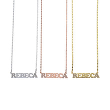 Gold, rose gold, and silver name necklaces shown together