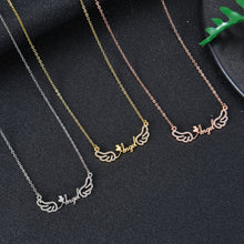Multiple custom angel wing necklaces in different finishes