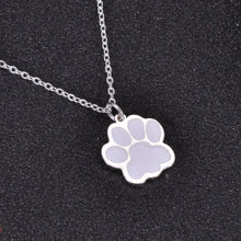 Silver paw print necklace with white enamel charm