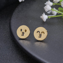 Emoji stud earrings displaying kiss-face design