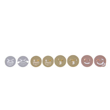 Emoji stud earrings displaying kiss-face design