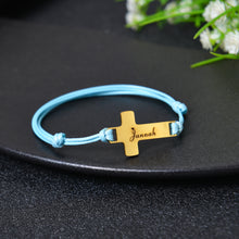 Blue cord personalized cross bracelet with engraved name