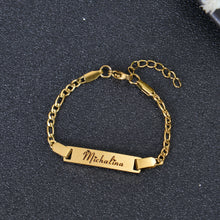 An Image of Gold Nameplate Bracelet