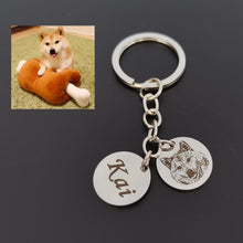 Silver personalized pet photo keychain with engraved dog or cat portrait and custom pet name charm