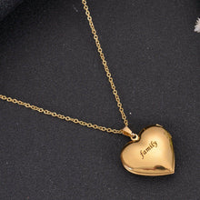 Closed gold heart locket pendant featuring custom engraved text message on polished front cover.