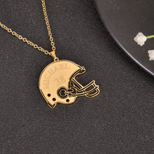 Gold personalized football helmet necklace engraved with a custom player name and number.