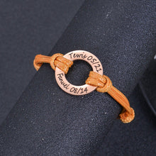 Custom washer charm rose gold bracelet on jewelry display