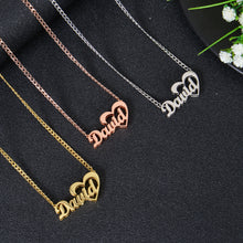 Grouping of gold, rose gold, and silver open heart script name necklaces showcasing finish options and chain style.