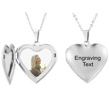Silver personalized heart locket necklace shown in open position holding custom photo memorial insert.