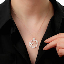 Model wearing gold heartbeat necklace as memorial keepsake