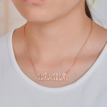 Iced out personalized name jewelry styled as statement fashion