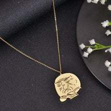 Gold meme face necklace featuring a selectable funny cartoon design