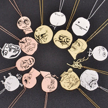 Collection of different meme face pendants in gold silver and rose gold