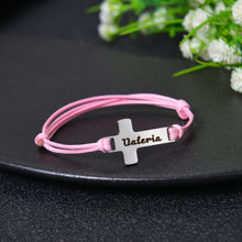 Pink cord personalized cross bracelet with engraved name