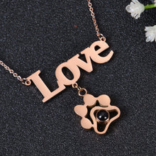 Rose gold personalized name necklace with paw print photo charm