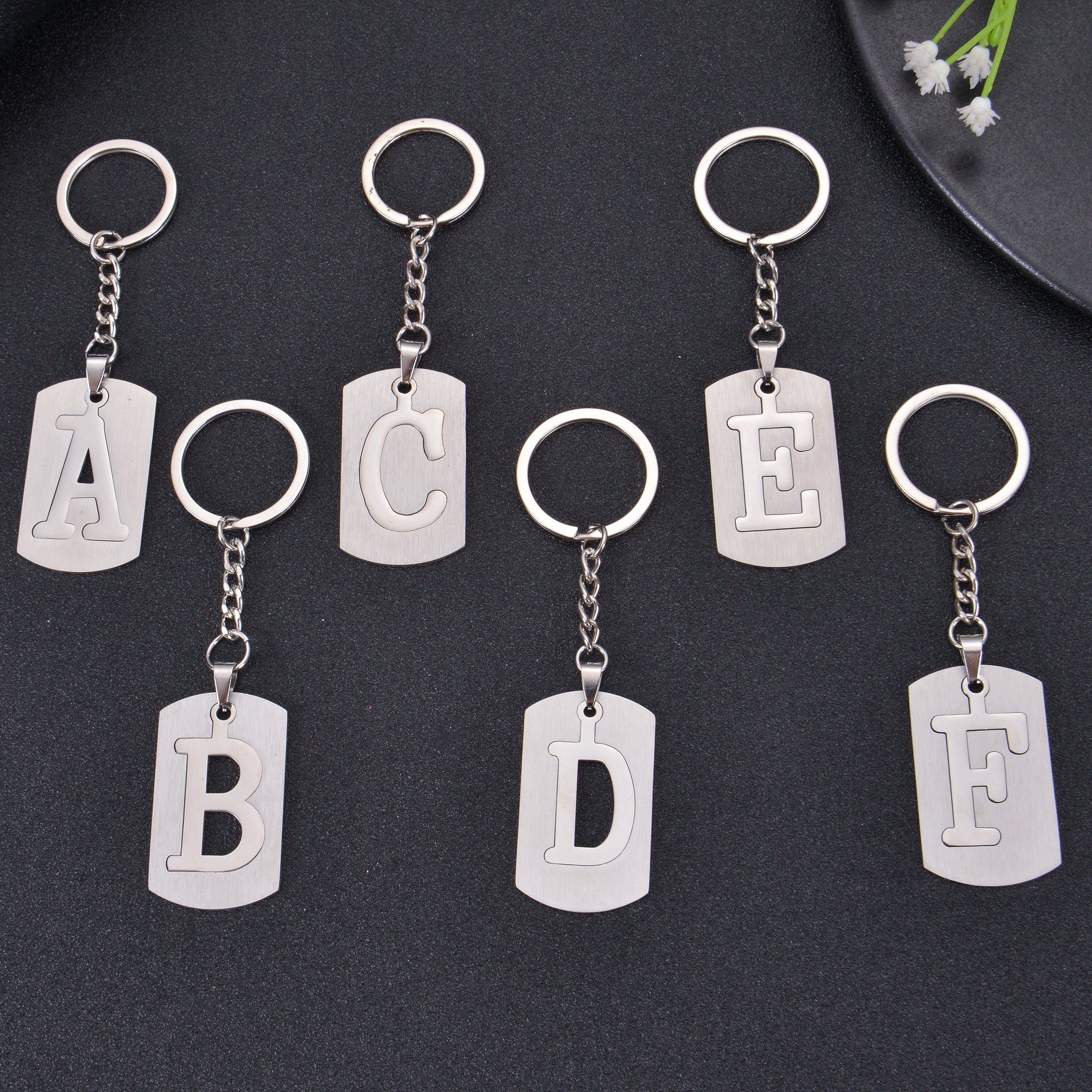 https://pendantify.com/cdn/shop/files/personalized-a-z-initial-keychain-pendantify-2_30bc7a69-6113-40c7-9bbb-c8514a932ec7.jpg?v=1690513814