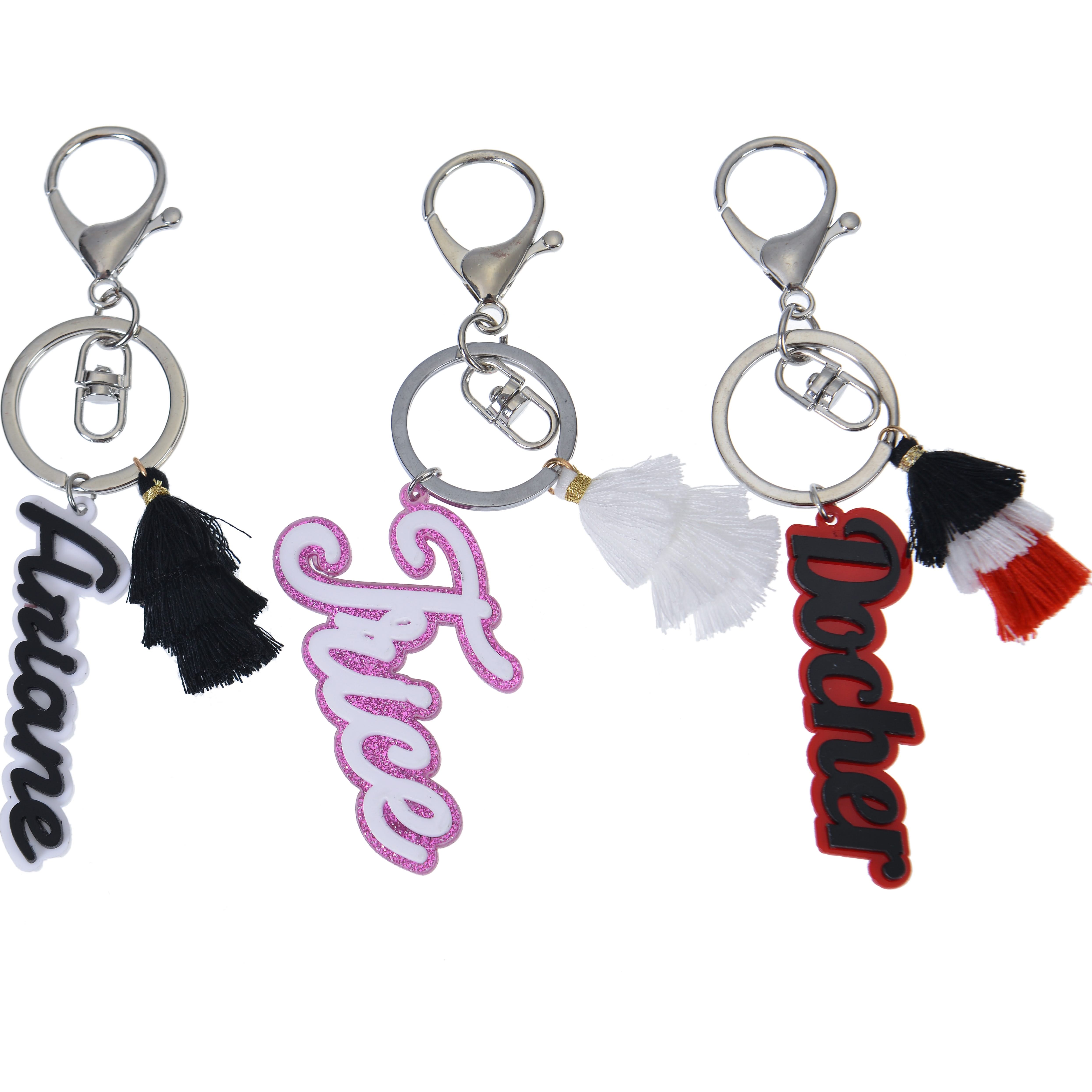 Multiple custom name tassel keychains shown together