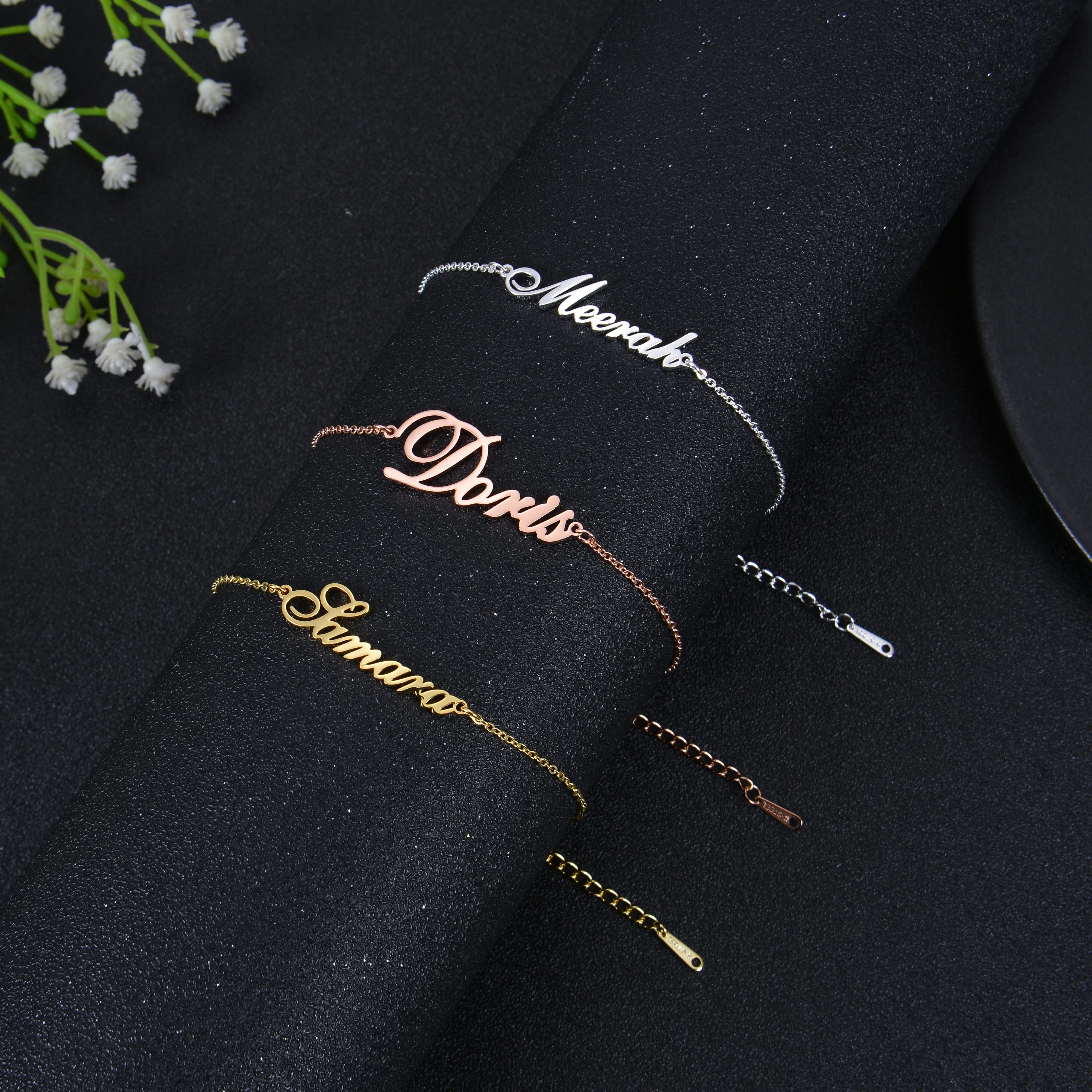 Gold, silver, and rose gold name anklets shown together