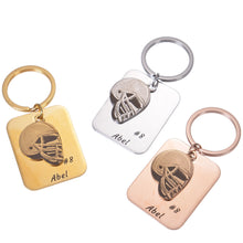 Gold, Silver, and Rose Gold personalized football helmet keychains displayed together.