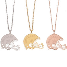 Gold, Silver, and Rose Gold personalized football helmet necklaces displayed together.
