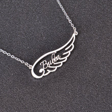 Personalized engraved angel wing necklace worn as meaningful memorial jewelry
