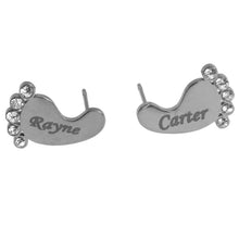 Silver personalized baby feet stud earrings featuring engraved baby names.