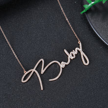 Rose gold personalized cursive name necklace with cubic zirconia