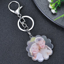Personalized flower photo keychain featuring a custom picture in a floral acrylic design.